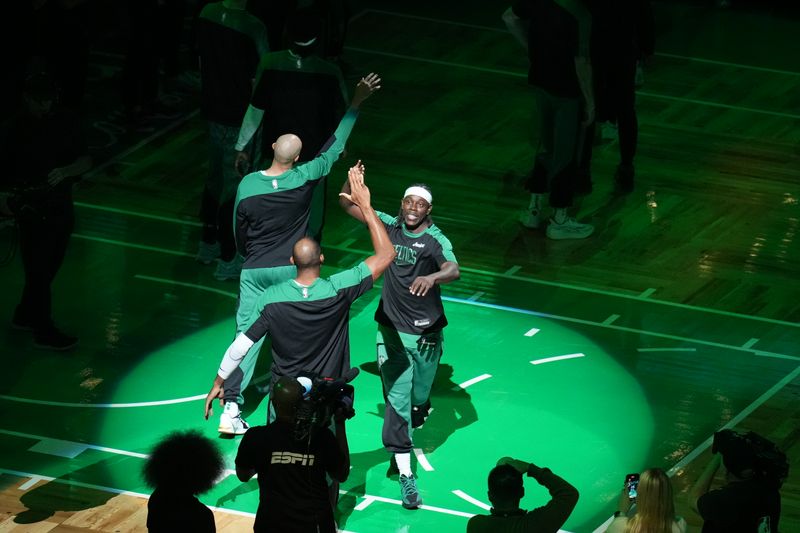 BOSTON, MA - NOVEMBER 6: Jrue Holiday #4 of the Boston Celtics is introduced before the game against the Golden State Warriors on November 6, 2024 at TD Garden in Boston, Massachusetts. NOTE TO USER: User expressly acknowledges and agrees that, by downloading and/or using this Photograph, user is consenting to the terms and conditions of the Getty Images License Agreement. Mandatory Copyright Notice: Copyright 2024 NBAE (Photo by Jesse D. Garrabrant/NBAE via Getty Images)