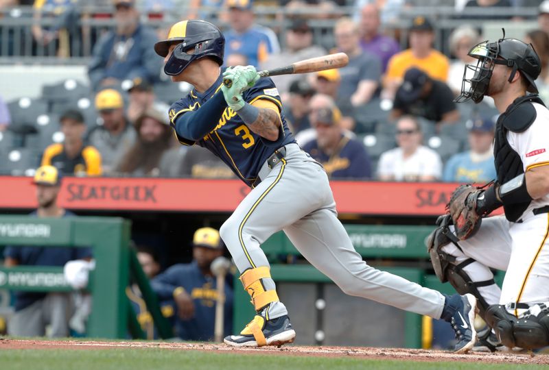 Sep 26, 2024; Pittsburgh, Pennsylvania, USA;  Milwaukee Brewers third baseman Joey Ortiz (3) hits a triple against the Pittsburgh Pirates during the third inning at PNC Park. Mandatory Credit: Charles LeClaire-Imagn Images