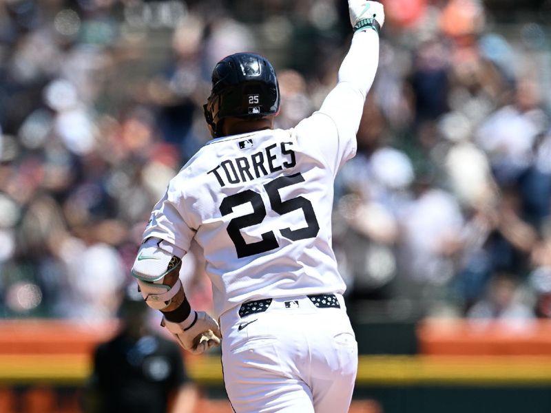 Jun 28, 2025; Detroit, Michigan, USA;  Detroit Tigers second baseman Gleyber Torres (25) celebrates after hitting a two-run home run against the Minnesota Twins in the fourth inning at Comerica Park. Mandatory Credit: Lon Horwedel-Imagn Images