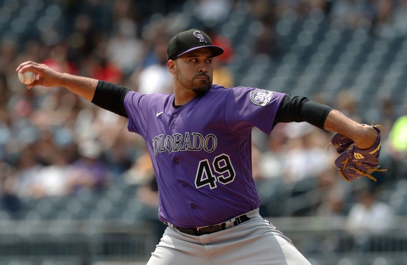 May 10, 2023; Pittsburgh, Pennsylvania, USA;  Colorado Rockies starting pitcher Antonio Senzatela (49) delivers a pitch against the Pittsburgh Pirates during the first inning at PNC Park. Mandatory Credit: Charles LeClaire-USA TODAY Sports