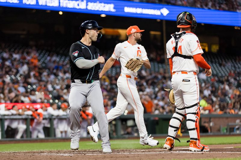 Sep 3, 2024; San Francisco, California, USA;  Arizona Diamondbacks left fielder Randal Grichuk (15) scores against the San Francisco Giants during the third inning at Oracle Park. Mandatory Credit: John Hefti-Imagn Images