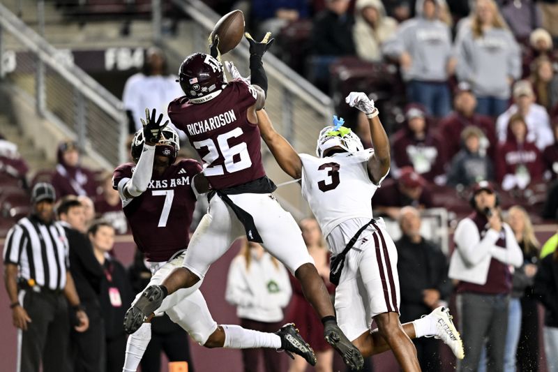 Nov 11, 2023; College Station, Texas, USA; Texas A&M Aggies defensive back Demani Richardson (26) breaks up a pass in the end zone intended for Mississippi State Bulldogs wide receiver Justin Robinson (3) at Kyle Field. Mandatory Credit: Maria Lysaker-USA TODAY Sports