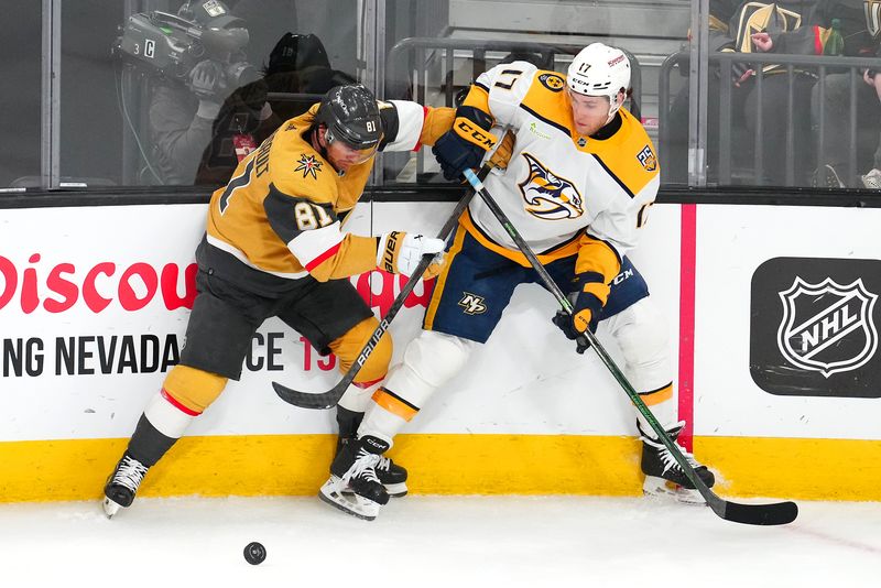 Feb 20, 2024; Las Vegas, Nevada, USA; Vegas Golden Knights right wing Jonathan Marchessault (81) tips the puck away from Nashville Predators center Mark Jankowski (17) during the third period at T-Mobile Arena. Mandatory Credit: Stephen R. Sylvanie-USA TODAY Sports