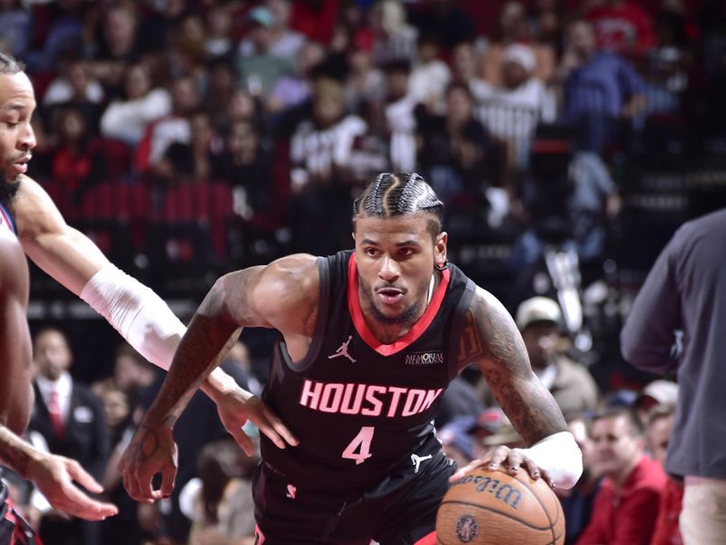 HOUSTON, TX - NOVEMBER 15: Jalen Green #4 of the Houston Rockets dribbles the ball during the game against the LA Clippers during the Emirates NBA Cup game on November 15, 2024 at the Toyota Center in Houston, Texas. NOTE TO USER: User expressly acknowledges and agrees that, by downloading and or using this photograph, User is consenting to the terms and conditions of the Getty Images License Agreement. Mandatory Copyright Notice: Copyright 2024 NBAE (Photo by Logan Riely/NBAE via Getty Images)