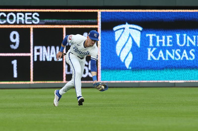 Jul 20, 2024; Kansas City, Missouri, USA; Kansas City Royals outfielder Drew Waters (6) fields a ball against the Chicago White Sox during the seventh inning at Kauffman Stadium. Mandatory Credit: Scott Sewell-USA TODAY Sports