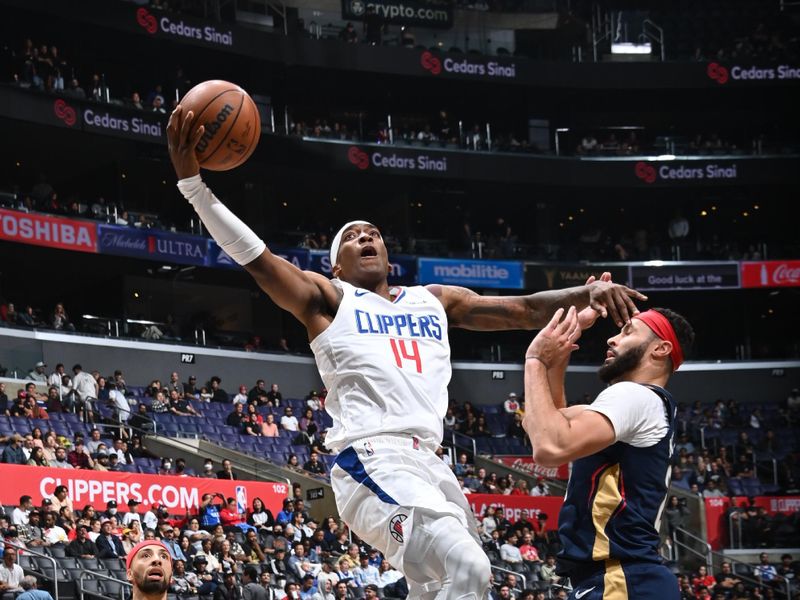 LOS ANGELES, CA - OCTOBER 30: Terance Mann #14 of the LA Clippers drives to the basket during the game against the New Orleans Pelicans on October 30, 2022 at Crypto.Com Arena in Los Angeles, California. NOTE TO USER: User expressly acknowledges and agrees that, by downloading and/or using this Photograph, user is consenting to the terms and conditions of the Getty Images License Agreement. Mandatory Copyright Notice: Copyright 2022 NBAE (Photo by Andrew D. Bernstein/NBAE via Getty Images)