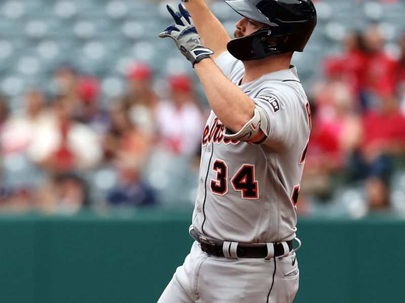 Sep 17, 2023; Anaheim, California, USA; Detroit Tigers catcher Jake Rogers (34) runs around bases after hitting a three-run home run during the third inning against the Los Angeles Angels at Angel Stadium. Mandatory Credit: Kiyoshi Mio-USA TODAY Sports