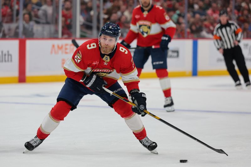 Mar 26, 2026; Sunrise, Florida, USA; Florida Panthers center Sam Bennett (9) moves the puck against the Minnesota Wild during the second period at Amerant Bank Arena. Mandatory Credit: Sam Navarro-Imagn Images Mar 26, 2026; Sunrise, Florida, USA; Florida Panthers center Sam Bennett (9) moves the puck against the Minnesota Wild during the second period at Amerant Bank Arena. Mandatory Credit: Sam Navarro-Imagn Images