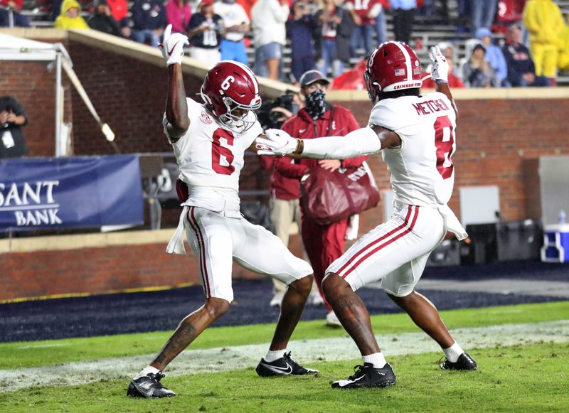 Oct 10, 2020; Oxford, MX, USA; Alabama wide receiver DeVonta Smith (6) and wide receiver John Metchie III (8) celebrate a touchdown against Mississippi at Vaught-Hemingway Stadium. Mandatory Credit: Kent Gidley via USA TODAY Sports