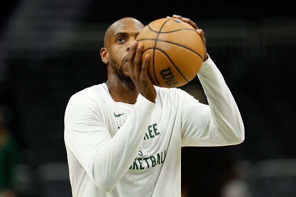 MILWAUKEE, WISCONSIN - DECEMBER 17: Khris Middleton #22 of the Milwaukee Bucks warms up before the game against the Houston Rockets at Fiserv Forum on December 17, 2023 in Milwaukee, Wisconsin. NOTE TO USER: User expressly acknowledges and agrees that, by downloading and or using this photograph, User is consenting to the terms and conditions of the Getty Images License Agreement. (Photo by John Fisher/Getty Images)