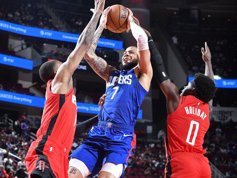 HOUSTON, TX - MARCH 6: Amir Coffey #7 of the LA Clippers drives to the basket during the game against the Houston Rockets on March 6, 2024 at the Toyota Center in Houston, Texas. NOTE TO USER: User expressly acknowledges and agrees that, by downloading and or using this photograph, User is consenting to the terms and conditions of the Getty Images License Agreement. Mandatory Copyright Notice: Copyright 2024 NBAE (Photo by Logan Riely/NBAE via Getty Images)