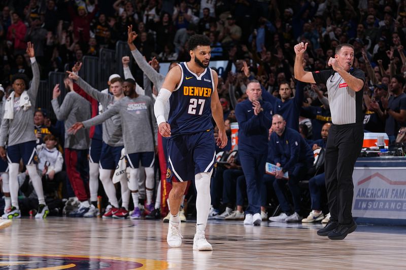 DENVER, CO - MARCH 11: Jamal Murray #27 of the Denver Nuggets celebrates during the game against the Toronto Raptors on March 11, 2024 at the Ball Arena in Denver, Colorado. NOTE TO USER: User expressly acknowledges and agrees that, by downloading and/or using this Photograph, user is consenting to the terms and conditions of the Getty Images License Agreement. Mandatory Copyright Notice: Copyright 2024 NBAE (Photo by Bart Young/NBAE via Getty Images)