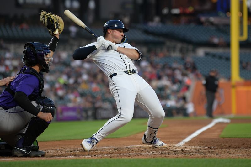 Sep 11, 2024; Detroit, Michigan, USA; Detroit Tigers first baseman Spencer Torkelson (20) ducks out of the way of a high inside pitch against the Colorado Rockies in the fourth inning at Comerica Park. Mandatory Credit: Lon Horwedel-Imagn Images