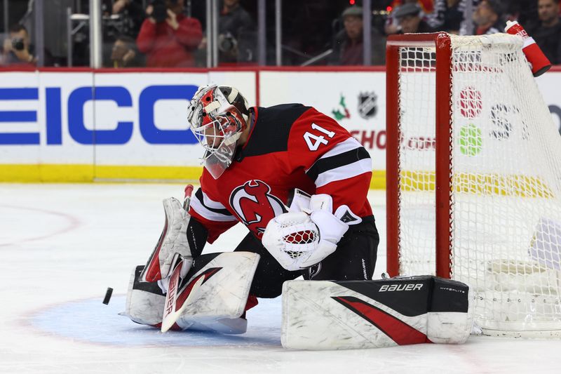 Dec 19, 2023; Newark, New Jersey, USA; New Jersey Devils goaltender Vitek Vanecek (41) makes a save against the Philadelphia Flyers during the first period at Prudential Center. Mandatory Credit: Ed Mulholland-USA TODAY Sports