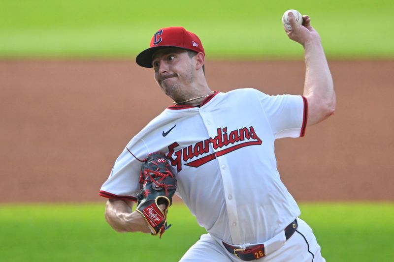 Jun 24, 2025; Cleveland, Ohio, USA; Cleveland Guardians starting pitcher Logan Allen (26) delivers a pitch in the first inning against the Toronto Blue Jays at Progressive Field. Mandatory Credit: David Richard-Imagn Images