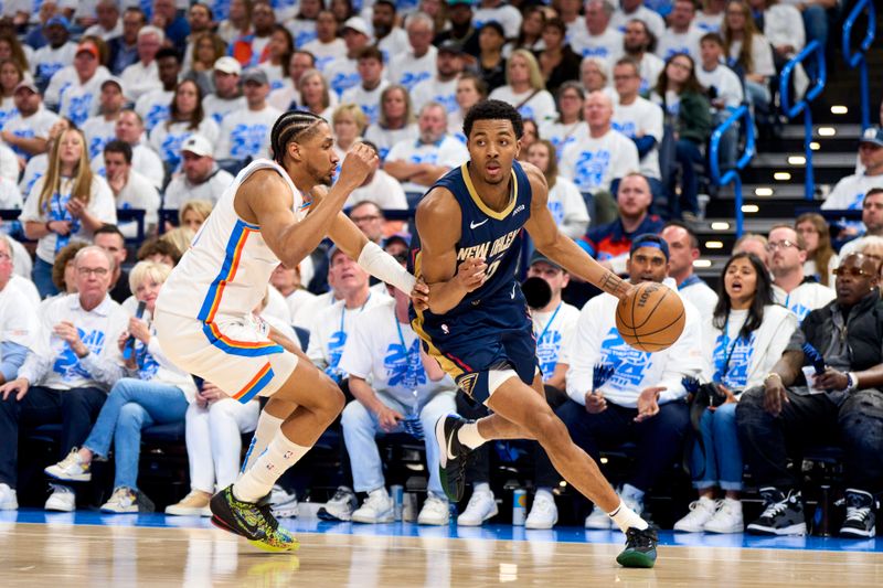 OKLAHOMA CITY, OKLAHOMA - APRIL 21: Trey Murphy III #25 of the New Orleans Pelicans drives to the basket against the Oklahoma City Thunder in game one of the Western Conference First Round Playoffs at the Paycom Center on April 21, 2024 in Oklahoma City, Oklahoma. NOTE TO USER: User expressly acknowledges and agrees that, by downloading and or using this photograph, User is consenting to the terms and conditions of the Getty Images License Agreement.  (Photo by Cooper Neill/Getty Images)