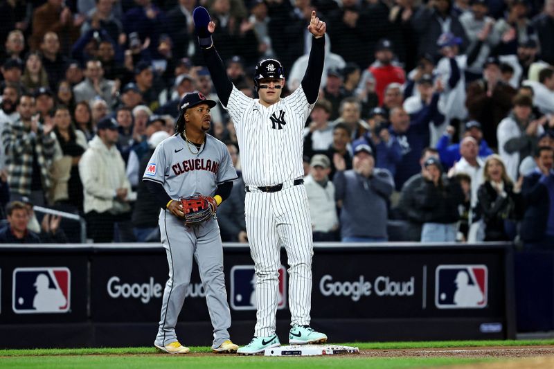 Oct 15, 2024; Bronx, New York, USA; New York Yankees first base Anthony Rizzo (48) celebrates after reaching third base during the second inning against the Cleveland Guardians in game two of the ALCS for the 2024 MLB Playoffs at Yankee Stadium. Mandatory Credit: Wendell Cruz-Imagn Images