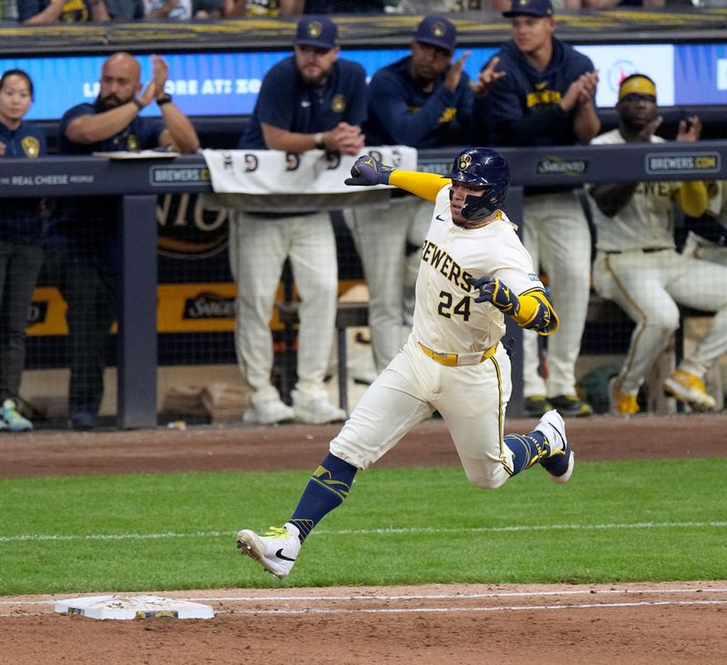 Jun 24, 2024; Milwaukee, Wisconsin, USA; Milwaukee Brewers catcher William Contreras (24) rounds first base after hitting a double during the seventh inning of their game against the Texas Rangers at American Family Field. Mandatory Credit: Mark Hoffman/INDIANAPOLIS STAR-USA TODAY Sports