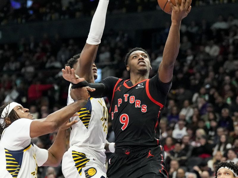 TORONTO, ON - DECEMBER 3: RJ Barrett #9 of the Toronto Raptors drives to the basket during the first half against the Indiana Pacers during the Emirates NBA Cup game at the Scotiabank Arena on December 3, 2024 in Toronto, Ontario, Canada. NOTE TO USER: User expressly acknowledges and agrees that, by downloading and/or using this Photograph, user is consenting to the terms and conditions of the Getty Images License Agreement. (Photo by Kevin Sousa/Getty Images)