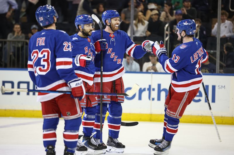 Mar 18, 2026; New York, New York, USA;  New York Rangers defenseman Vladislav Gavrikov (44) celebrates with his teammates after scoring a goal in the first period against the New Jersey Devils at Madison Square Garden. Mandatory Credit: Wendell Cruz-Imagn Images