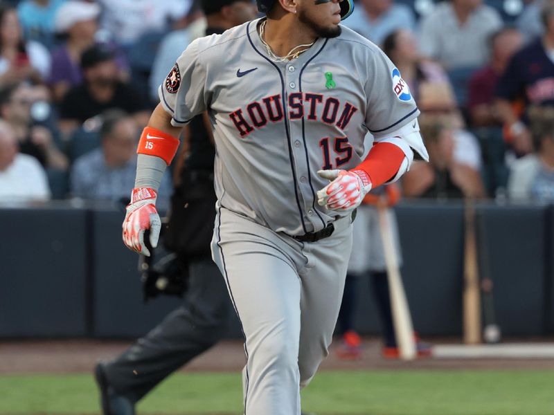 May 20, 2025; St. Petersburg, Florida, USA; Houston Astros third base Isaac Paredes (15) hits a home run against the Tampa Bay Rays during the third inning at George M. Steinbrenner Field. Mandatory Credit: Kim Klement Neitzel-Imagn Images
