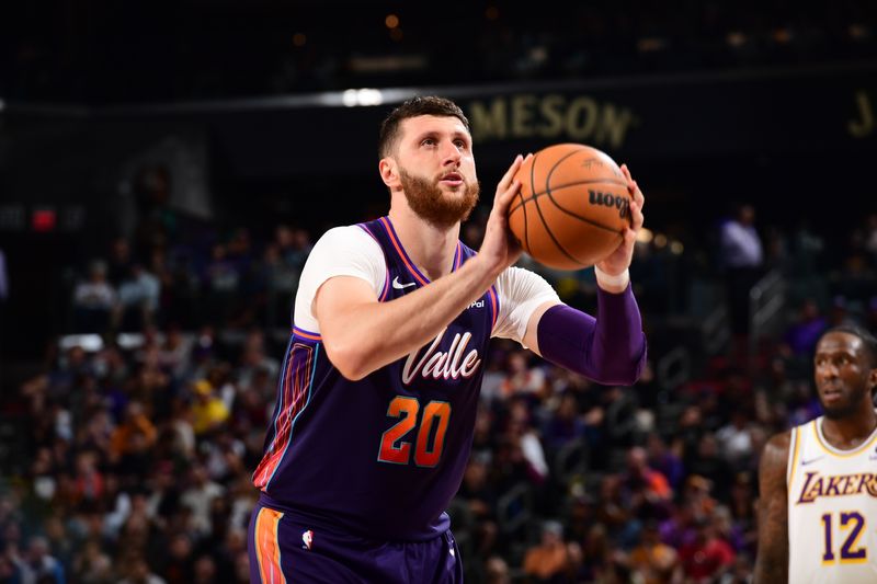 PHOENIX, AZ - FEBRUARY 25: Jusuf Nurkic #20 of the Phoenix Suns shoots a free throw during the game against the Los Angeles Lakers on February 25, 2024 at Footprint Center in Phoenix, Arizona. NOTE TO USER: User expressly acknowledges and agrees that, by downloading and or using this photograph, user is consenting to the terms and conditions of the Getty Images License Agreement. Mandatory Copyright Notice: Copyright 2024 NBAE (Photo by Kate Frese/NBAE via Getty Images)