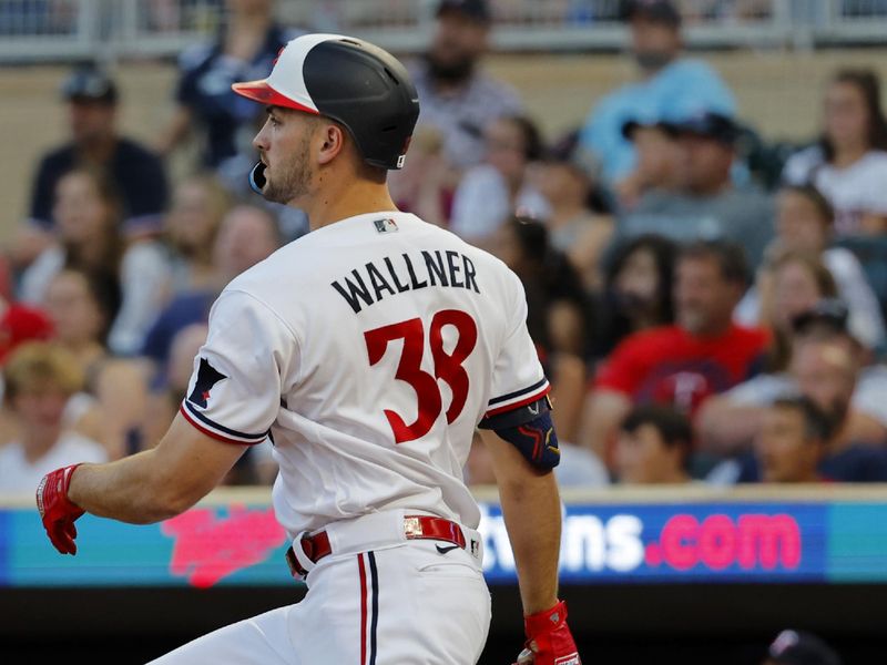 Aug 25, 2023; Minneapolis, Minnesota, USA; Minnesota Twins left fielder Matt Wallner (38) hits a three-run triple against the Texas Rangers in the first inning at Target Field. Mandatory Credit: Bruce Kluckhohn-USA TODAY Sports