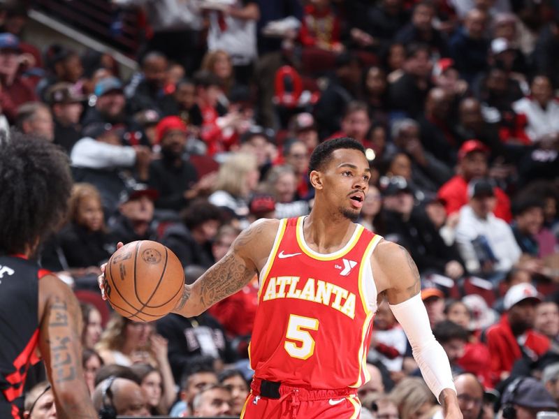 CHICAGO, IL - APRIL 1: Dejounte Murray #5 of the Atlanta Hawks dribbles the ball during the game against the Chicago Bulls on April 1, 2024 at United Center in Chicago, Illinois. NOTE TO USER: User expressly acknowledges and agrees that, by downloading and or using this photograph, User is consenting to the terms and conditions of the Getty Images License Agreement. Mandatory Copyright Notice: Copyright 2024 NBAE (Photo by Jeff Haynes/NBAE via Getty Images)