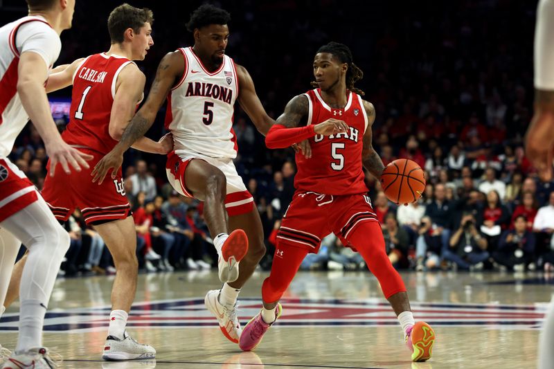 Jan 6, 2024; Tucson, Arizona, USA; Utah Utes guard Deivon Smith (5) dribbles the ball against Arizona Wildcats guard KJ Lewis (5) during the first half at McKale Center. Mandatory Credit: Zachary BonDurant-USA TODAY Sports