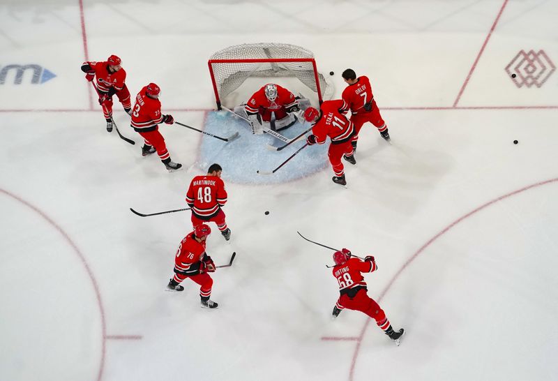 Dec 23, 2023; Raleigh, North Carolina, USA; Carolina Hurricanes players warmup before the game against the New York Islanders at PNC Arena. Mandatory Credit: James Guillory-USA TODAY Sports