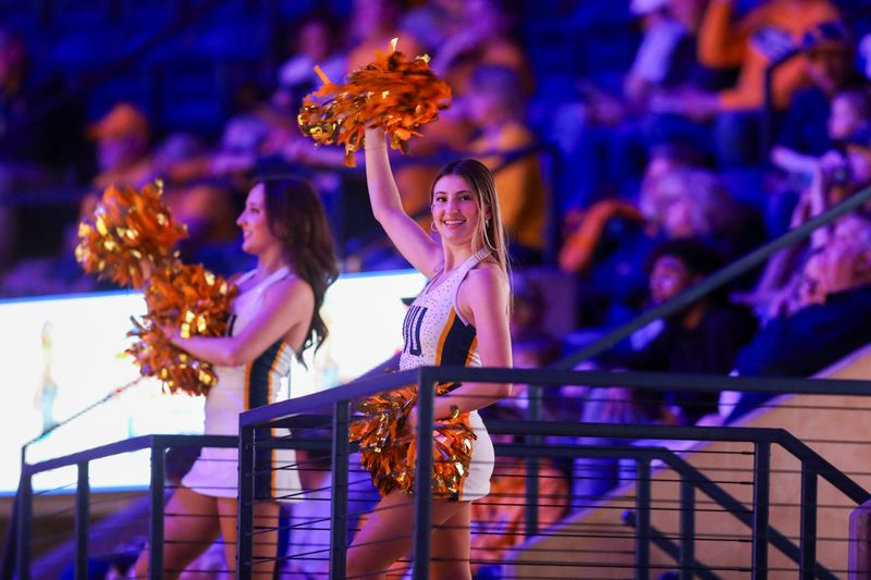 Feb 28, 2026; Morgantown, West Virginia, USA; A West Virginia Mountaineers dancer performs during the second half against the BYU Cougars at Hope Coliseum. Mandatory Credit: Ben Queen-Imagn Images