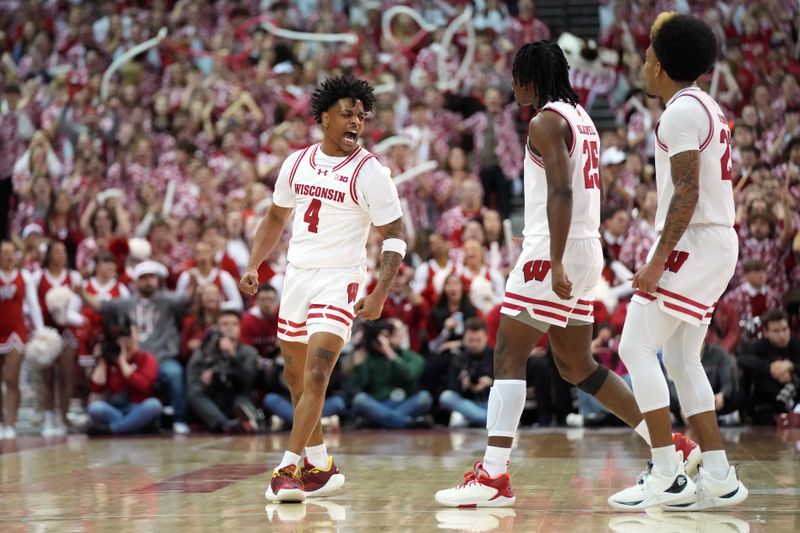 Mar 7, 2024; Madison, Wisconsin, USA; Wisconsin Badgers guard Kamari McGee (4) reacts to causing a turnover against the Rutgers Scarlet Knights during the second half at the Kohl Center. Mandatory Credit: Kayla Wolf-USA TODAY Sports