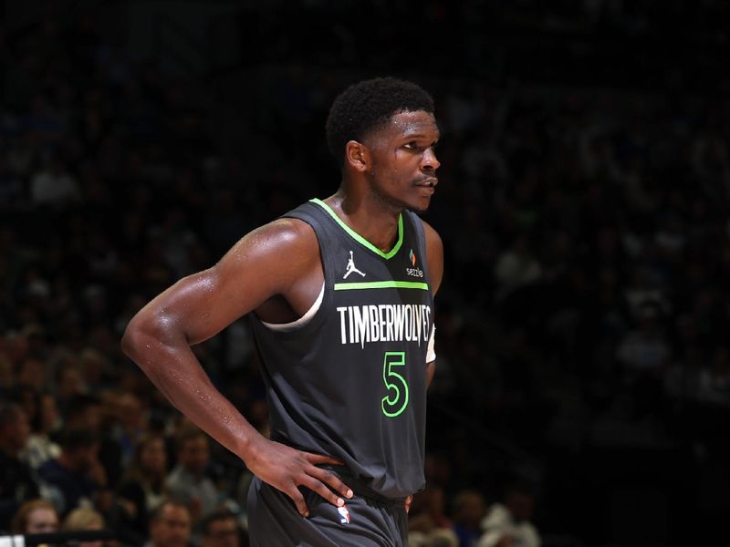 MINNEAPOLIS, MN -  NOVEMBER 1: Anthony Edwards #5 of the Minnesota Timberwolves looks on during the game against the Denver Nuggets on November 1, 2024 at Target Center in Minneapolis, Minnesota. NOTE TO USER: User expressly acknowledges and agrees that, by downloading and or using this Photograph, user is consenting to the terms and conditions of the Getty Images License Agreement. Mandatory Copyright Notice: Copyright 2024 NBAE (Photo by David Sherman/NBAE via Getty Images)