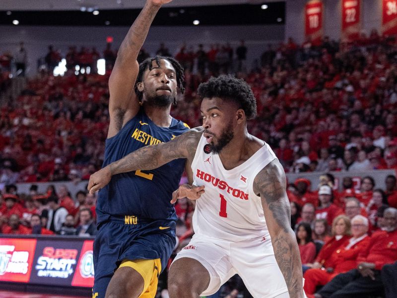 Jan 6, 2024; Houston, Texas, USA;Houston Cougars guard Jamal Shead (1) dribbles against West Virginia Mountaineers guard Kobe Johnson (2) in the second half at Fertitta Center. Mandatory Credit: Thomas Shea-USA TODAY Sports