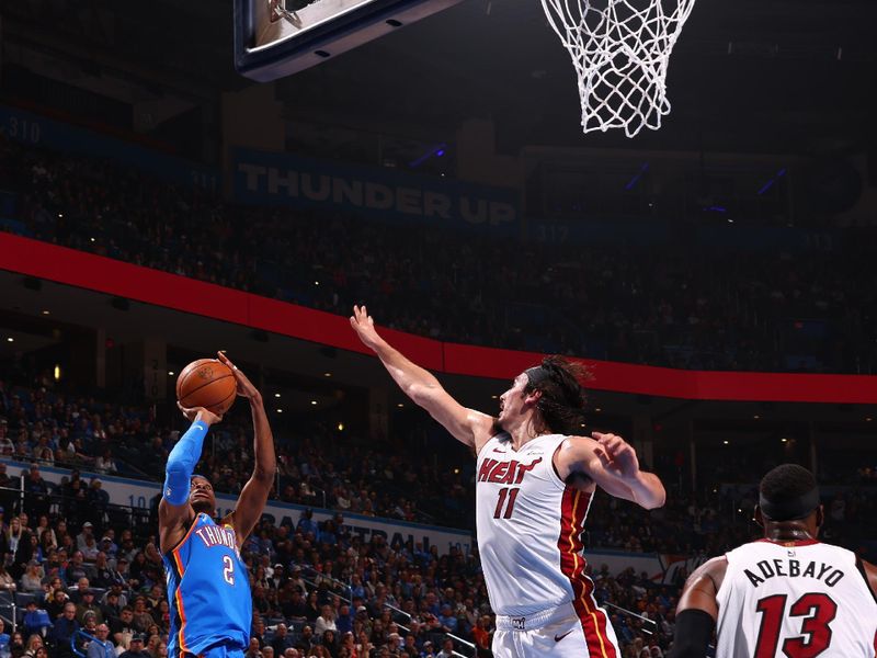 OKLAHOMA CITY, OK - MARCH 8:  Shai Gilgeous-Alexander #2 of the Oklahoma City Thunder shoots the ball during the game against the Miami Heat on March 8, 2024 at Paycom Arena in Oklahoma City, Oklahoma. NOTE TO USER: User expressly acknowledges and agrees that, by downloading and or using this photograph, User is consenting to the terms and conditions of the Getty Images License Agreement. Mandatory Copyright Notice: Copyright 2024 NBAE (Photo by Zach Beeker/NBAE via Getty Images)