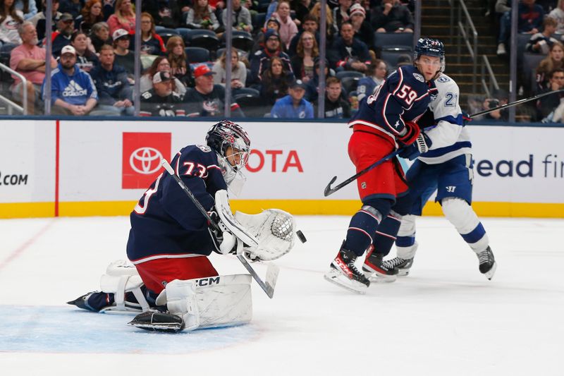 Oct 18, 2025; Columbus, Ohio, USA; Columbus Blue Jackets goalie Jet Greaves (73) makes a save against the Tampa Bay Lightning during the third period at Nationwide Arena. Mandatory Credit: Russell LaBounty-Imagn Images