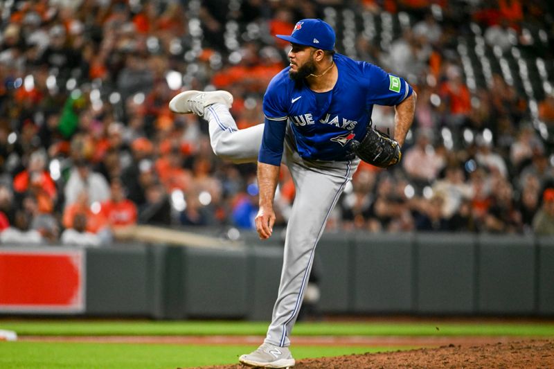 May 13, 2024; Baltimore, Maryland, USA;  Toronto Blue Jays pitcher Yimi García (93) throws a eighth inning pitch against the Baltimore Orioles at Oriole Park at Camden Yards. Mandatory Credit: Tommy Gilligan-USA TODAY Sports