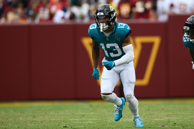 Jacksonville Jaguars wide receiver Christian Kirk (13) in action during the second half of a NFL football game against the Washington Commanders, Sunday, Sept. 11, 2022, in Landover, Md. (AP Photo/Nick Wass)