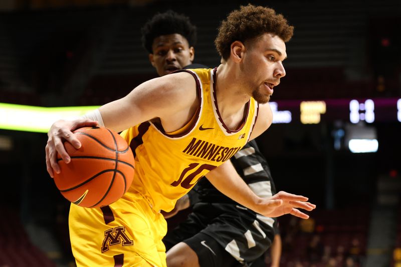 Dec 22, 2022; Minneapolis, Minnesota, USA; Minnesota Golden Gophers forward Jamison Battle (10) drives to the basket against the Chicago State Cougars during the first half at Williams Arena. Mandatory Credit: Matt Krohn-USA TODAY Sports