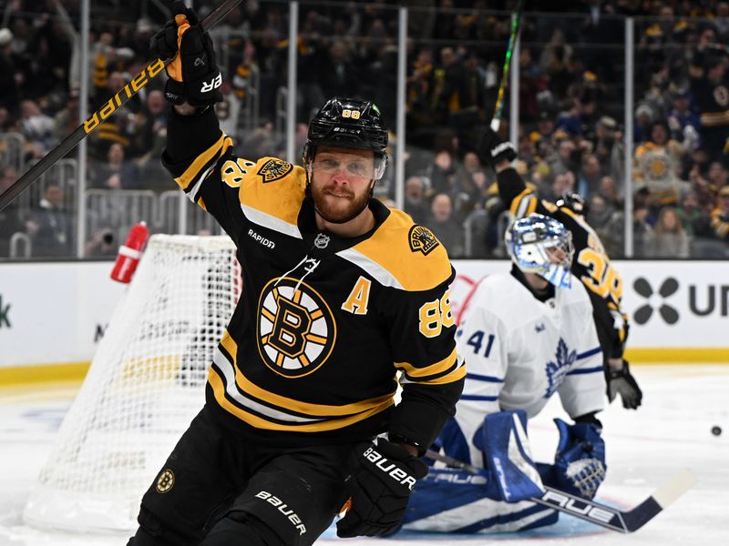 Feb 25, 2025; Boston, Massachusetts, USA;  Boston Bruins right wing David Pastrnak (88) celebrates after scoring a goal against the Toronto Maple Leafs during the first period at the TD Garden. Mandatory Credit: Brian Fluharty-Imagn Images