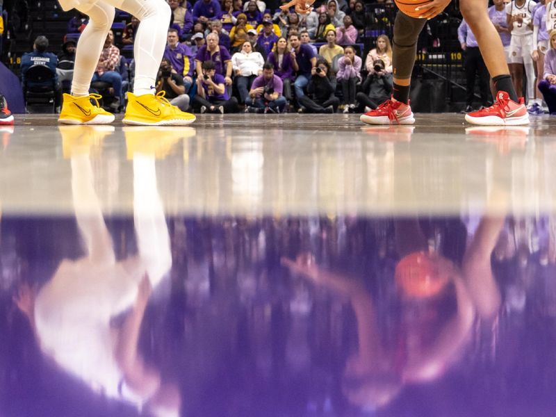 Feb 2, 2023; Baton Rouge, Louisiana, USA; Georgia Lady Bulldogs guard Diamond Battles (3) dribbles against LSU Lady Tigers guard Alexis Morris (45) during the second half at Pete Maravich Assembly Center. Mandatory Credit: Stephen Lew-USA TODAY Sports