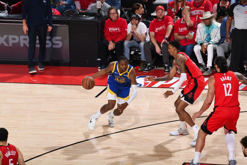 HOUSTON, TX - APRIL 23: Jonathan Kuminga #00 of the Golden State Warriors handles the ball during the game against the Houston Rockets during Round 1 Game 2 of the 2025 NBA Playoffs on April 23, 2025 at the Toyota Center in Houston, Texas. NOTE TO USER: User expressly acknowledges and agrees that, by downloading and or using this photograph, User is consenting to the terms and conditions of the Getty Images License Agreement. Mandatory Copyright Notice: Copyright 2025 NBAE (Photo by Noah Graham/NBAE via Getty Images)