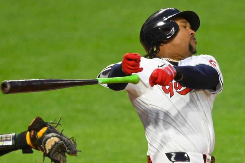 Apr 20, 2024; Cleveland, Ohio, USA; Cleveland Guardians third baseman Jose Ramirez (11) loses his bat while striking out in the seventh inning against the Oakland Athletics at Progressive Field. Mandatory Credit: David Richard-USA TODAY Sports