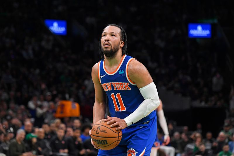 BOSTON, MA - APRIL 11: Jalen Brunson #11 of the New York Knicks shoots a free throw during the game against the Boston Celtics on April 11, 2024 at the TD Garden in Boston, Massachusetts. NOTE TO USER: User expressly acknowledges and agrees that, by downloading and or using this photograph, User is consenting to the terms and conditions of the Getty Images License Agreement. Mandatory Copyright Notice: Copyright 2024 NBAE  (Photo by Brian Babineau/NBAE via Getty Images)