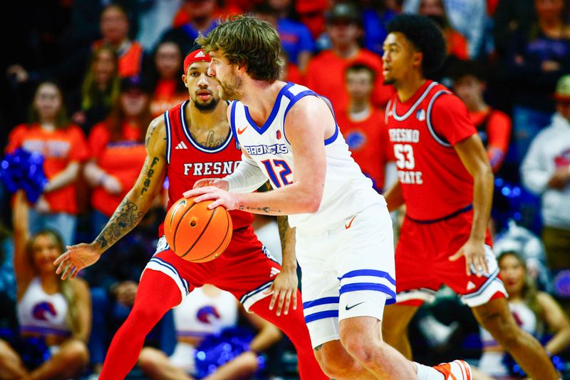 Feb 17, 2024; Boise, Idaho, USA; Boise State Broncos guard Max Rice (12) during the first half against the Fresno State Bulldogs at ExtraMile Arena. Mandatory Credit: Brian Losness-USA TODAY Sports


