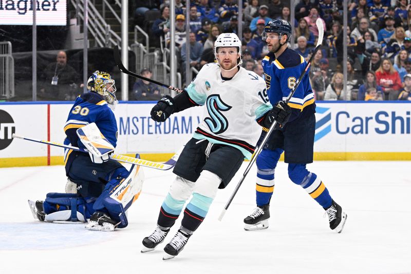 Apr 14, 2024; St. Louis, Missouri, USA; Seattle Kraken left wing Jared McCann (19) looks on after scoring a goal against St. Louis Blues goaltender Joel Hofer (30) during the first period at Enterprise Center. Mandatory Credit: Jeff Le-USA TODAY Sports