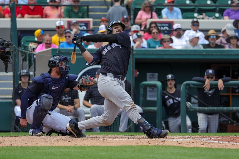 Mar 23, 2024; Lakeland, Florida, USA; New York Yankees catcher Austin Wells (88) bats during the third inning against the Detroit Tigers at Publix Field at Joker Marchant Stadium. Mandatory Credit: Mike Watters-USA TODAY Sports