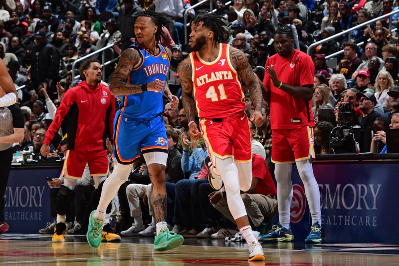 ATLANTA, GA - JANUARY 3: Saddiq Bey #41 of the Atlanta Hawks reacts during the game against the Oklahoma City Thunder on January 3, 2024 at State Farm Arena in Atlanta, Georgia.  NOTE TO USER: User expressly acknowledges and agrees that, by downloading and/or using this Photograph, user is consenting to the terms and conditions of the Getty Images License Agreement. Mandatory Copyright Notice: Copyright 2024 NBAE (Photo by Scott Cunningham/NBAE via Getty Images)