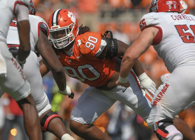 Sep 21, 2024; Clemson, South Carolina, USA; Clemson Tigers defensive end Stephiylan Green (90) rushes against the North Carolina State Wolfpack offense during the fourth quarter at Memorial Stadium. Mandatory Credit: Ken Ruinard-Imagn Images