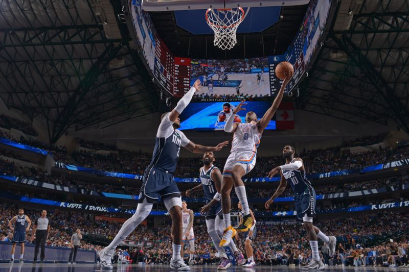 DALLAS, TX - FEBRUARY 10: Jalen Williams #8 of the Oklahoma City Thunder drives to the basket during the game against the Dallas Mavericks on February 10, 2024 at the American Airlines Center in Dallas, Texas. NOTE TO USER: User expressly acknowledges and agrees that, by downloading and or using this photograph, User is consenting to the terms and conditions of the Getty Images License Agreement. Mandatory Copyright Notice: Copyright 2024 NBAE (Photo by Glenn James/NBAE via Getty Images)